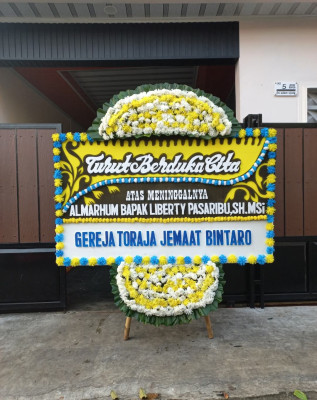 Papan Bunga Duka di Goyage